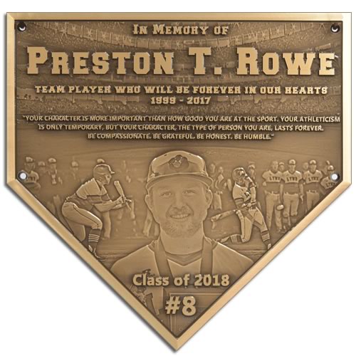 A bronze home plate memorial plaque