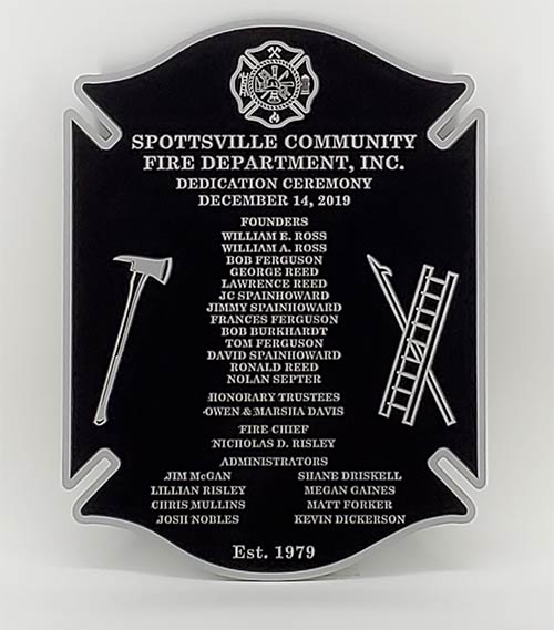 A aluminum plaque that was created for a Fire Department dedication ceremony