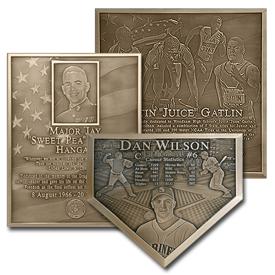 A cast aluminum plaque with engraved photo.