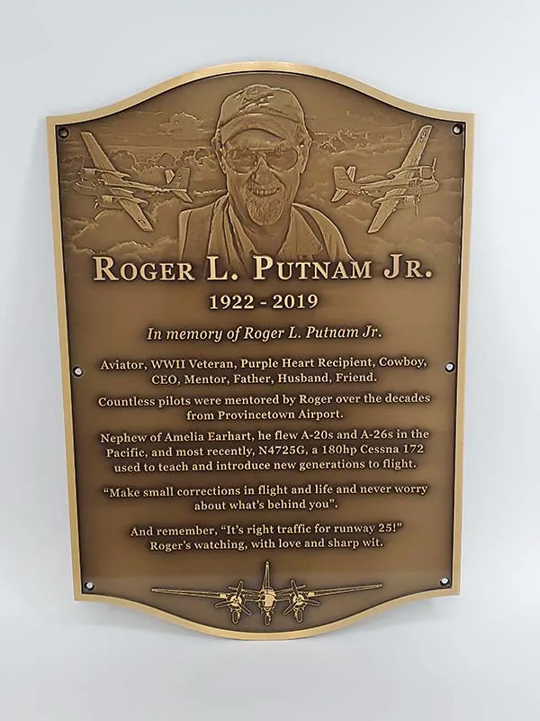 A bronze pilot dedication plaque.