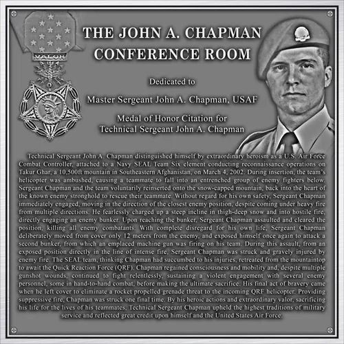 Bronze John A. Chapman Conference Room dedication plaque with portrait, Medal of Honor relief and the full citation.