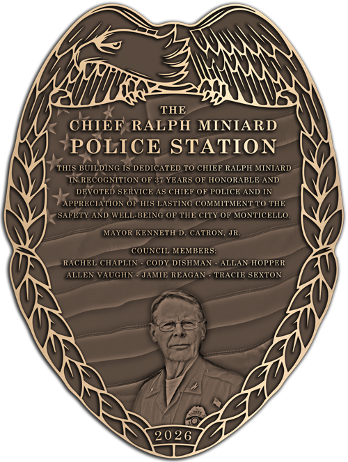 A bronze recognition plaque honoring a police chief.